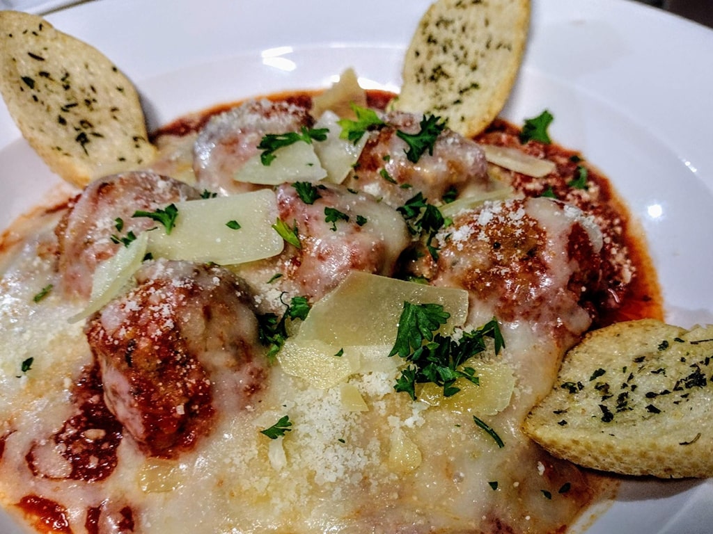 pasta and meatballs with garlic bread
