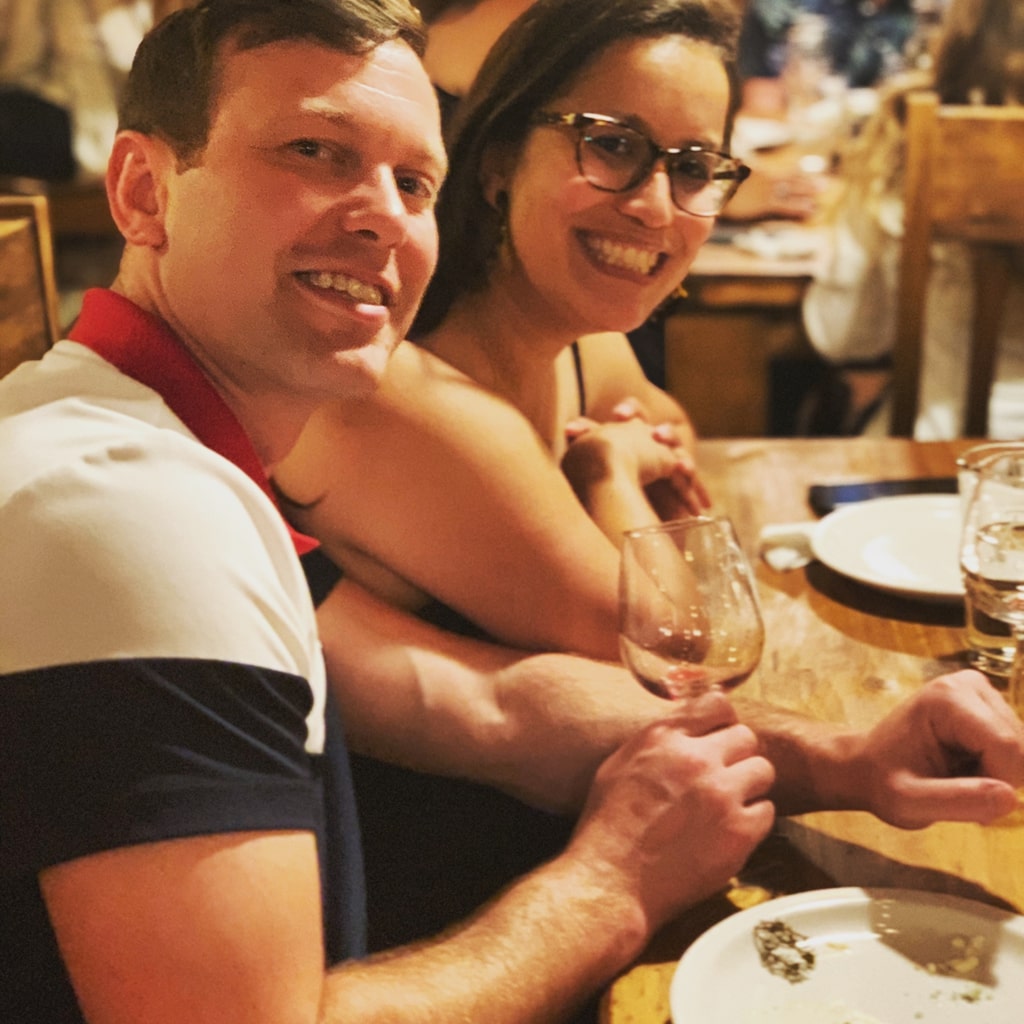 happy patron couple at R Wine Cellar Pittsburgh